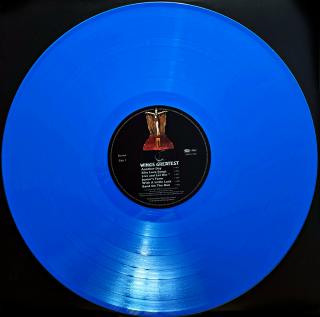 LP Wings – Wings Greatest (čtěte popis) (Modrý vinyl + plakát + vnitřní obal s potiskem. Vnější obal chybí. Deska je v krásném a lesklém stavu, pouze několik vlásenek. Hraje výborně, bezvadný zvuk. Vnitřní obal je v krásném stavu. Plakát je lehce natržený