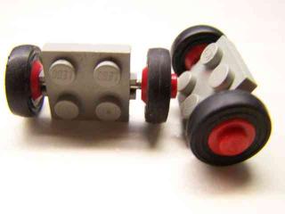 Lego Kolo placaté upravené 2 × 2 pneumatika 14mm × 4mm světle šedá