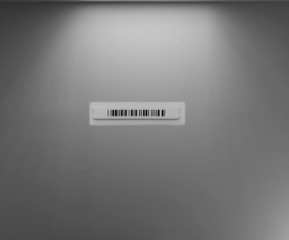AM bezpečnostní etiketa lepící s barcodem