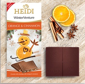 Heidi Winter Venture Orange 90g - DMT 15.09.2024 (mléčná čokoláda s kousky sušeného pomeranče a skořicí)