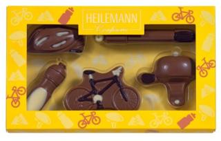 Heilemann cyklistika 100g  (figurky z té nejjemnější mléčné, bílé a hořké čokolády.)