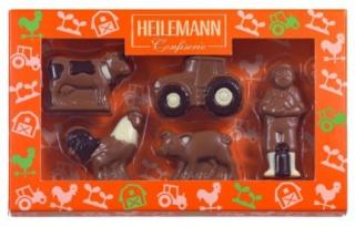 Heilemann farma 100g  (Pět figurek z té nejjemnější mléčné čokolády s detaily z bílé a hořké čokolády.)