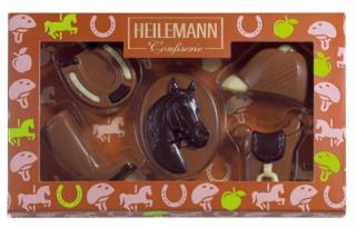 Heilemann koně 100g  ( sladké figurky z té nejjemnější mléčné, bílé a hořké čokolády.)