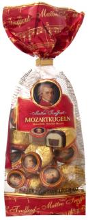 Maitre Mozart Kuglen - Mozartovy koule v sáčku 300g (Koule plněné pistáciovým marcipánem 34%, marcipánem z lískových oříšků 22%, nugátem 12%, potažené mléčnou čokoládou 16% a hořkou čokoládou 16%vým nugátem)
