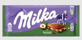 Milka Haselnuss 100g (Mléčná čokoláda z alpského mléka s drcenými jádry lískových ořechů.)