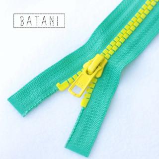 zip YKK - ozdobný smaragd/žlutá 60cm