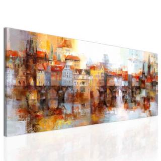 Obraz snové pražské panoráma - oranžové Velikost (šířka x výška): 100x40 cm